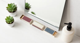She Put Vintage Matchboxes On Her Tiny Bathroom Mirror, And It’s The Cutest Storage I’ve Seen
